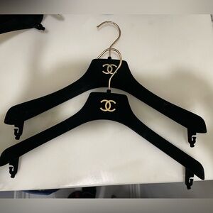 CHANEL Black Hangers with Gold Logo